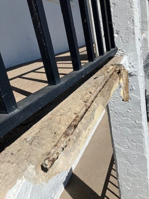 Before exterior floor stucco repair on a Largo, Florida home